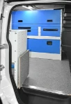 04_A folding table on the side of the racking in the 2021 Caddy