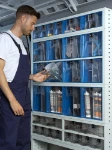 20_A large tilting container in a van racking system