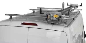 A Ford Transit with a ladder slide on aerodynamic roof bars