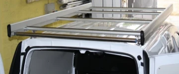 A roof rack with side fences and a rear roller on a Mercedes Citan
