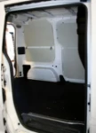 Berlingo Citroen con rivestimento interno in legno e lamiera