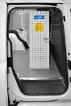 Floor panel, panelling and shelving on the bulkhead of the Caddy