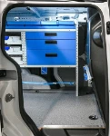 Metal drawers, plastic containers and rail with strap in the Courier