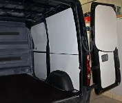 Rivestimento lato sinistro del Dokker con copriruota in alluminio mandorlato