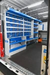 Scaffali con cassetti trasparenti e compressore su Opel Movano
