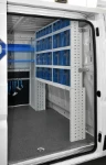 Tilting transparent containers on the Jumper’s bulkhead
